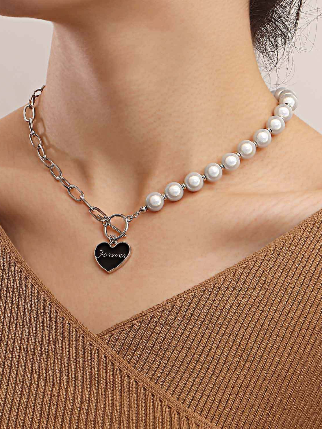 Pearl stitching love necklace